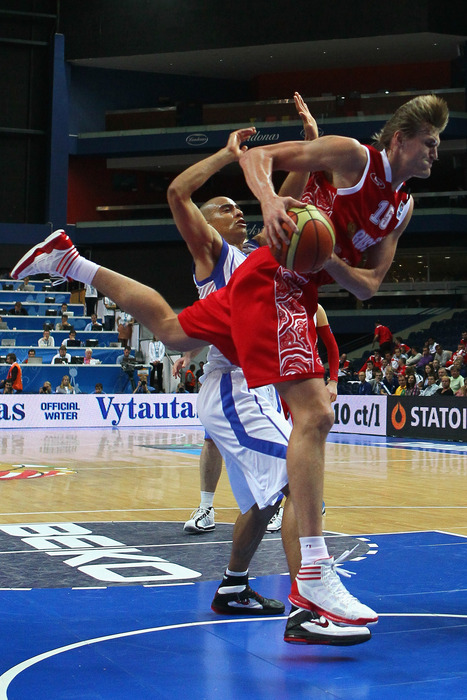 Shawn Huff of Finland defends against Andrei Kirilenko of Russia during the EuroBasket 2011 second round. 