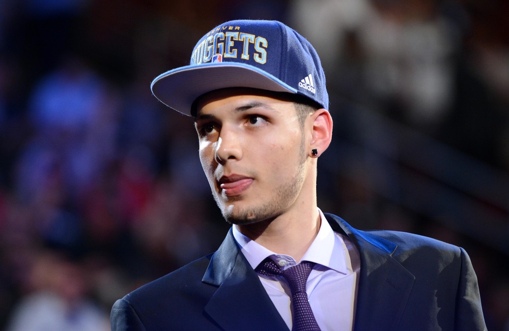 Newark, NJ, Evan Fournier walks to the stage after being introduced as the 20th overall pick to the Denver Nuggets.