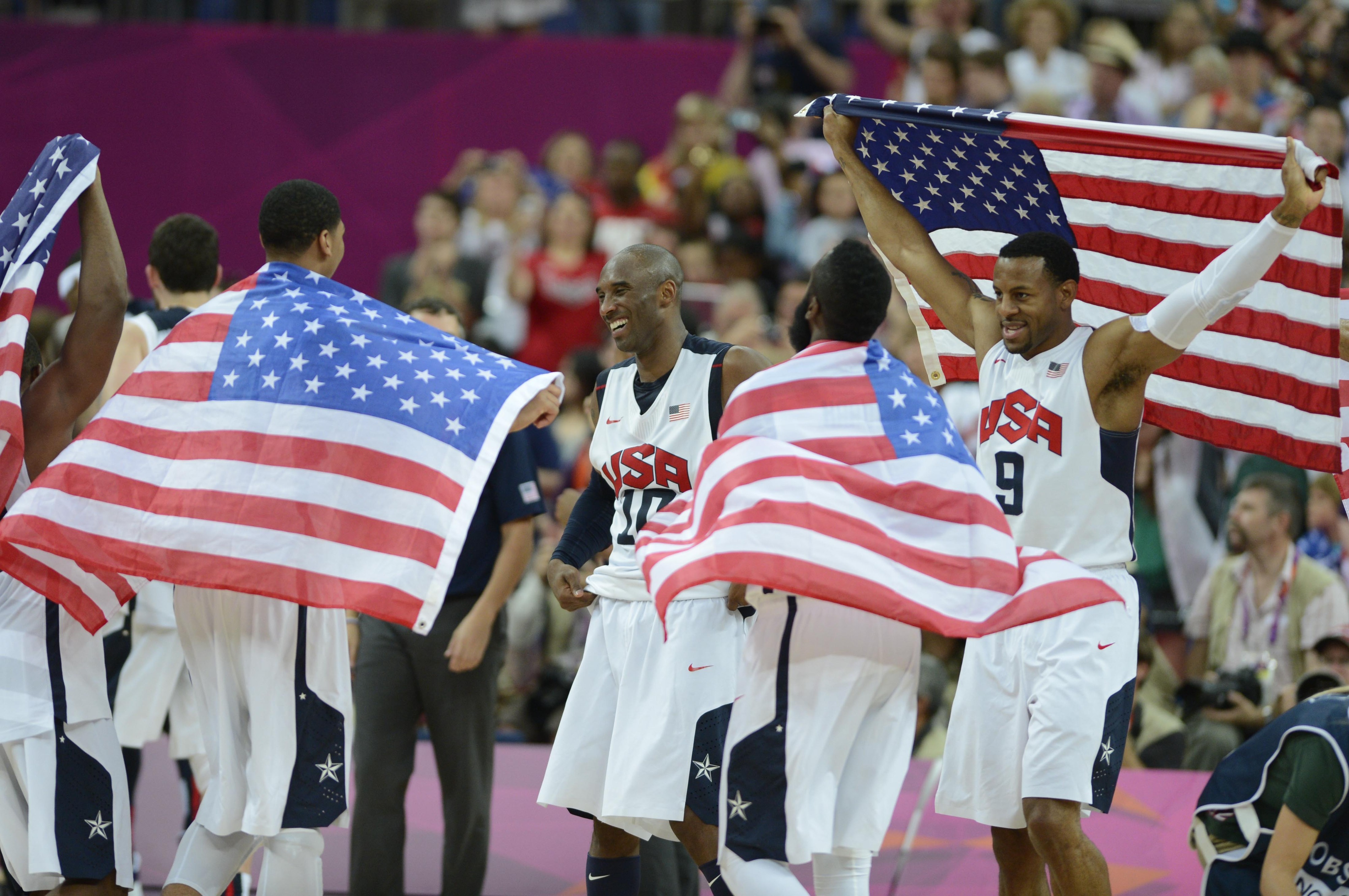 New Nugget Andre Iguodala (9) and guard Kobe Bryant (10) celebrate their gold medal victory over Spain on Sunday.