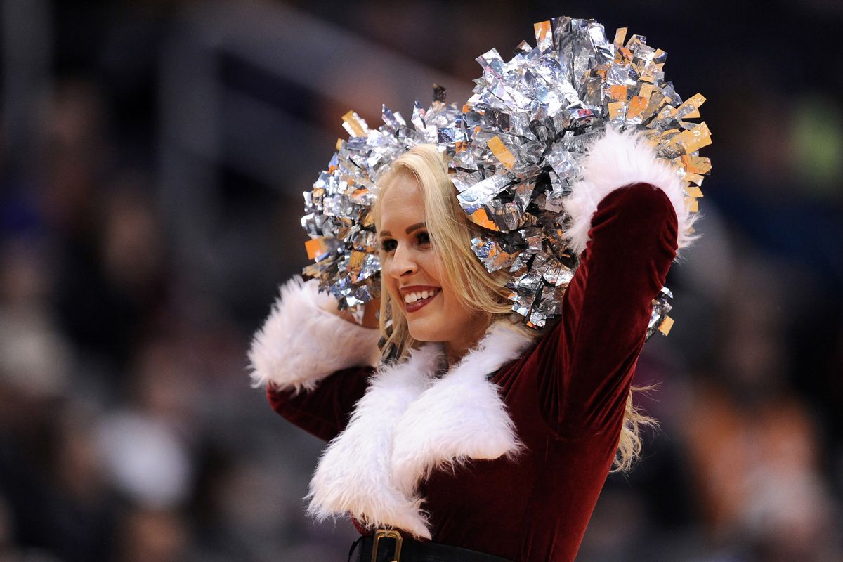 This Phoenix Suns dancer does NOT want to hear the score of yesterday's game, but seems to be in the holiday spirit, nonetheless...