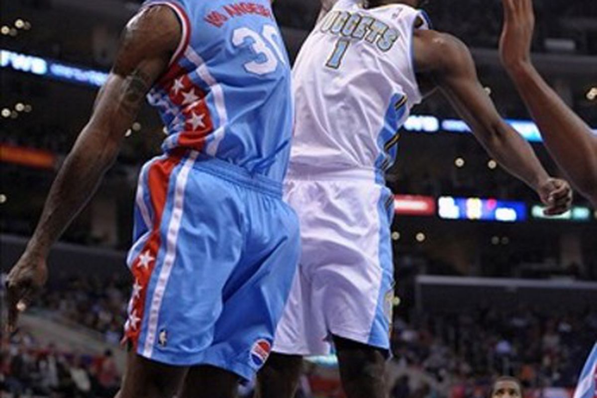Jordan Hamilton (1) about to dunk on Reggie Evans (30) for two of his 18 points on Feb. 22, 2012 in Los Angeles.