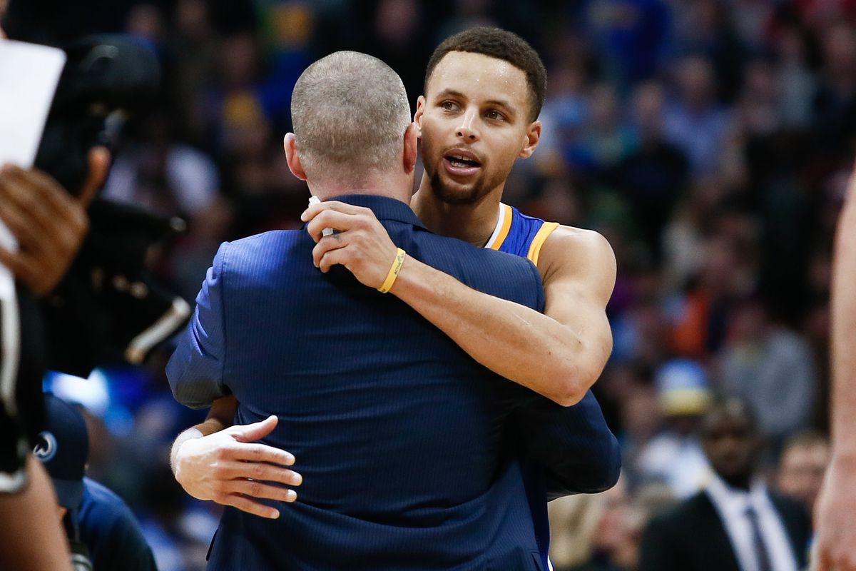 Steph Curry showing Michael Malone a little love on the occasion of a Nuggets win