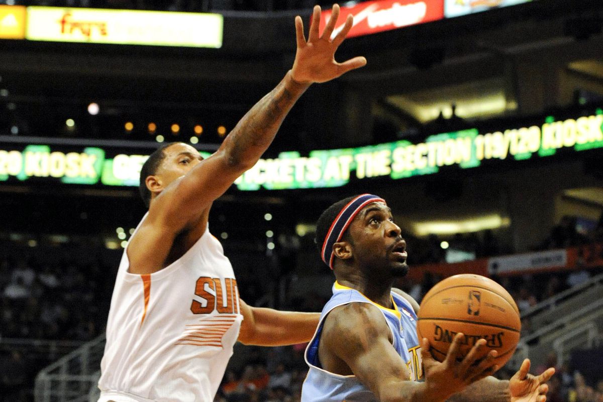 Ty Lawson drives against Channing Frye in a November contest