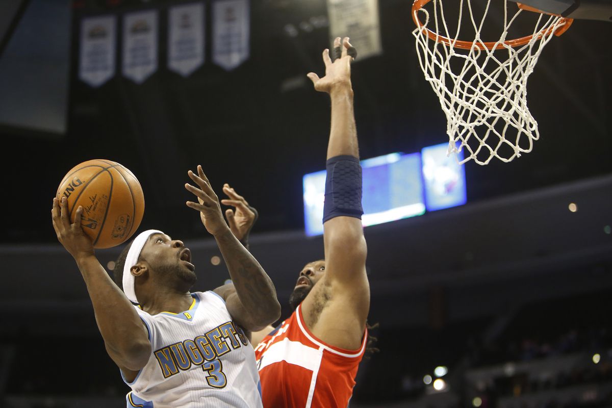 Ty Lawson says hello to old friend Nene.