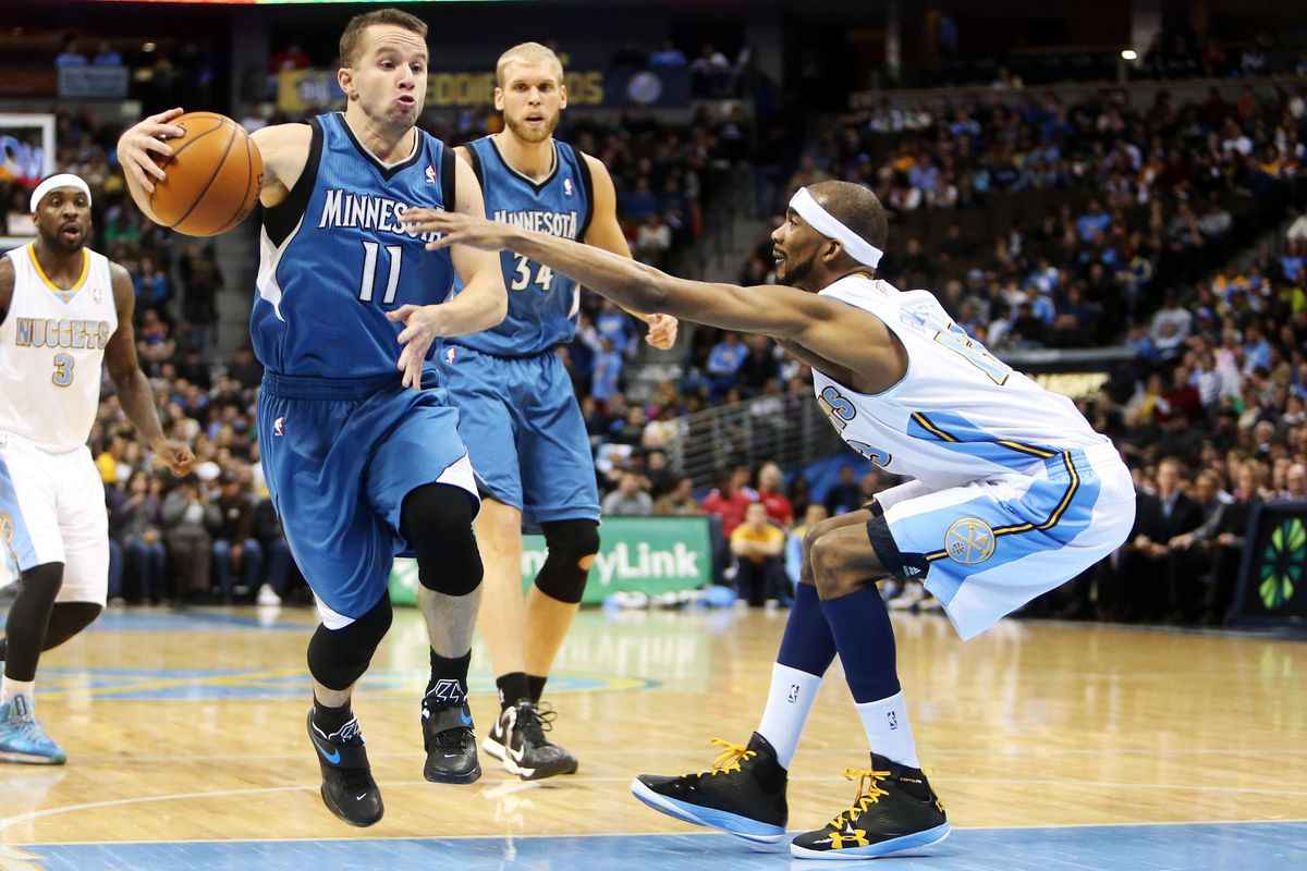 Corey Brewer utilizes his necromorph-like appendages to disrupt Barea's drive.