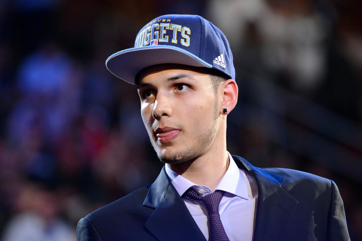 Newark, NJ, Evan Fournier walks to the stage after being introduced as the 20th overall pick to the Denver Nuggets.