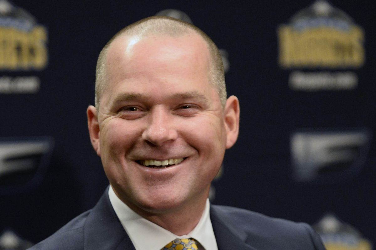 One of many changes for this season's Nuggets, at the far end of the bench - Coach Michael Malone