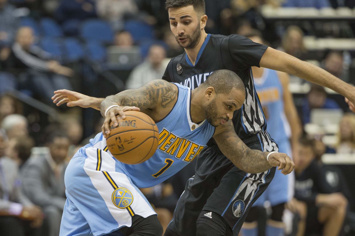 Jameer Nelson holds his head - and part of Ricky Rubio's torso - up. Jameer has shouldered a lot of late.