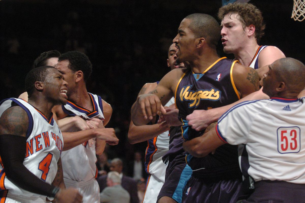 New York Knicks’ Nate Robinson has words with a player from