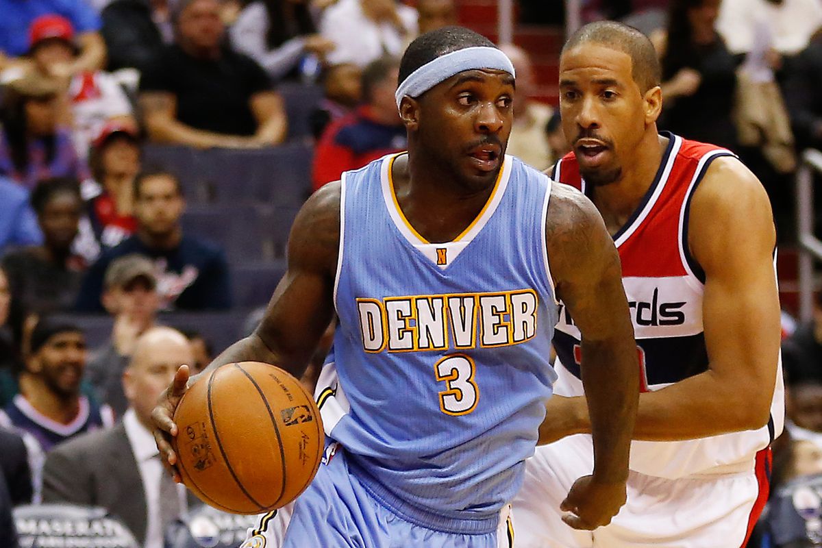 All around me are familiar faces. Ty Lawson and Andre Miller.