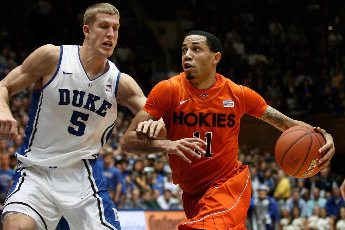 Erick Green driving in Miles Plumlee - both guys are now NBA players.