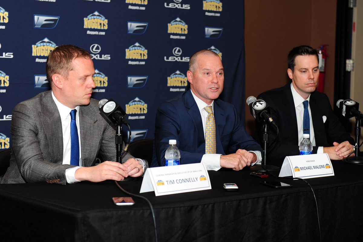 3-D. Michael Malone, Tim Connelly, and Josh Kroenke dare some defense 